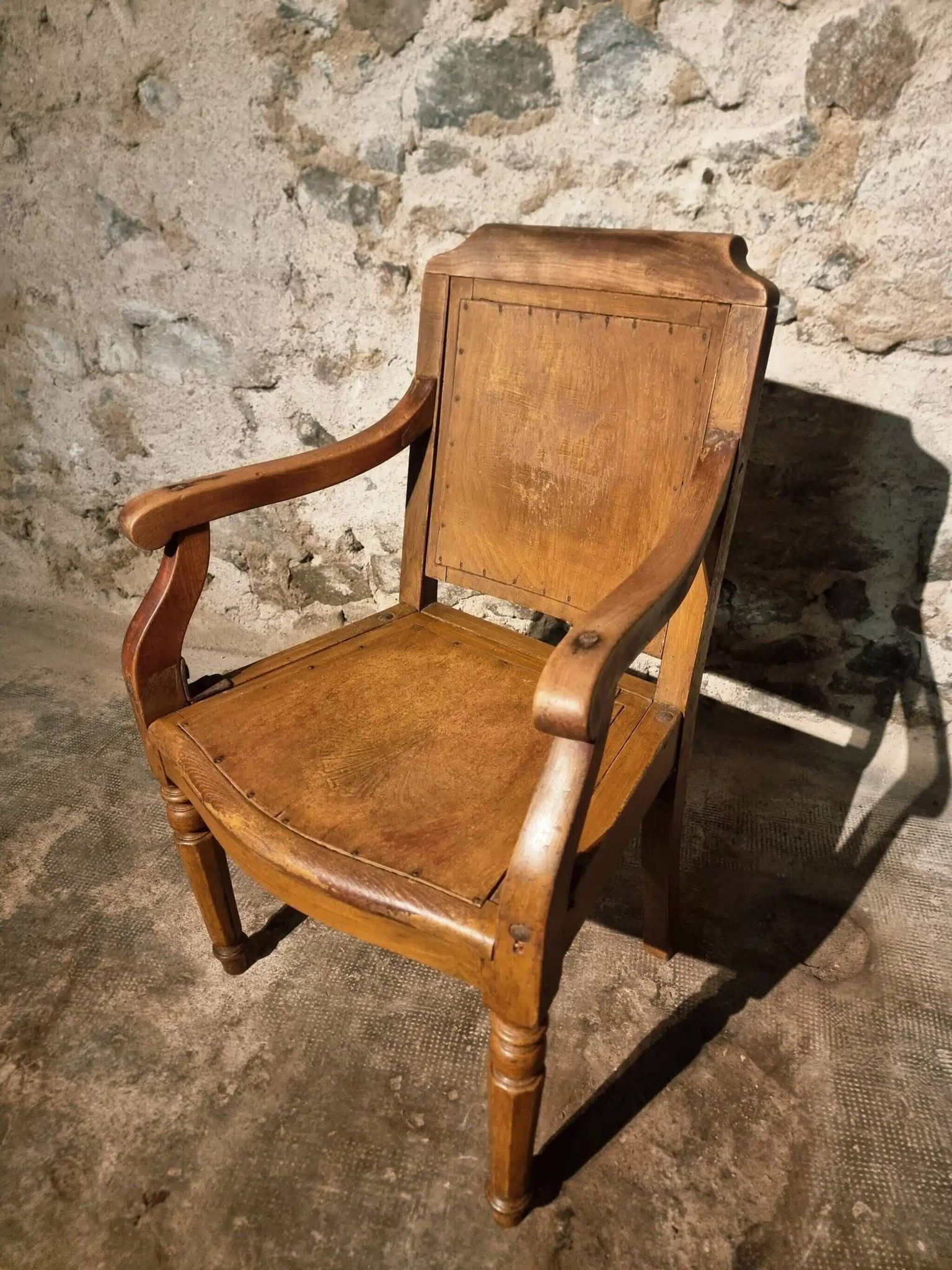 Antique French barber's chair, early 1900s