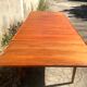 Extendable dining table with vintage 60s teak extensions