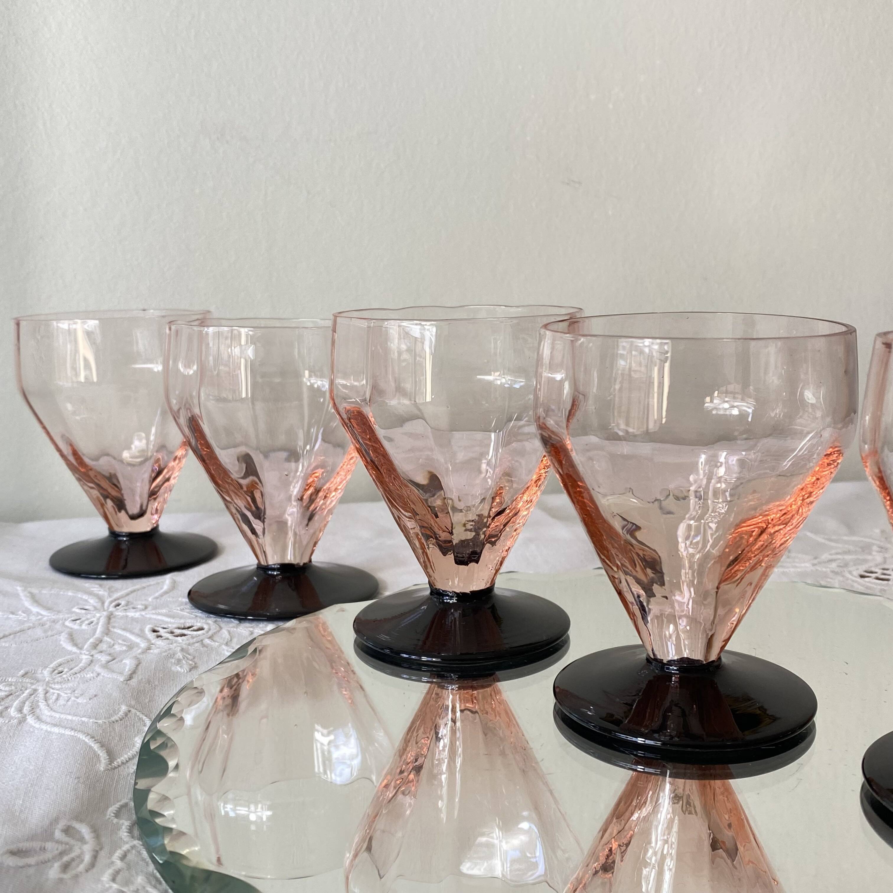 6 Art Deco pink wine or water glasses with black stems.