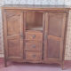 Haberdashery workbench with two doors and three drawers.