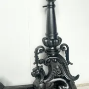 19th-century cast iron fireplace set, bar, andirons & plaque with griffins