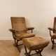 Pair of vintage 70s armchairs in brown and orange velvet with footrest.