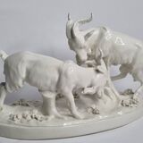 Saxon porcelain group, two fighting goats, signed Röhle, 1900