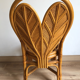 Chaise rotin dossier à forme de feuille