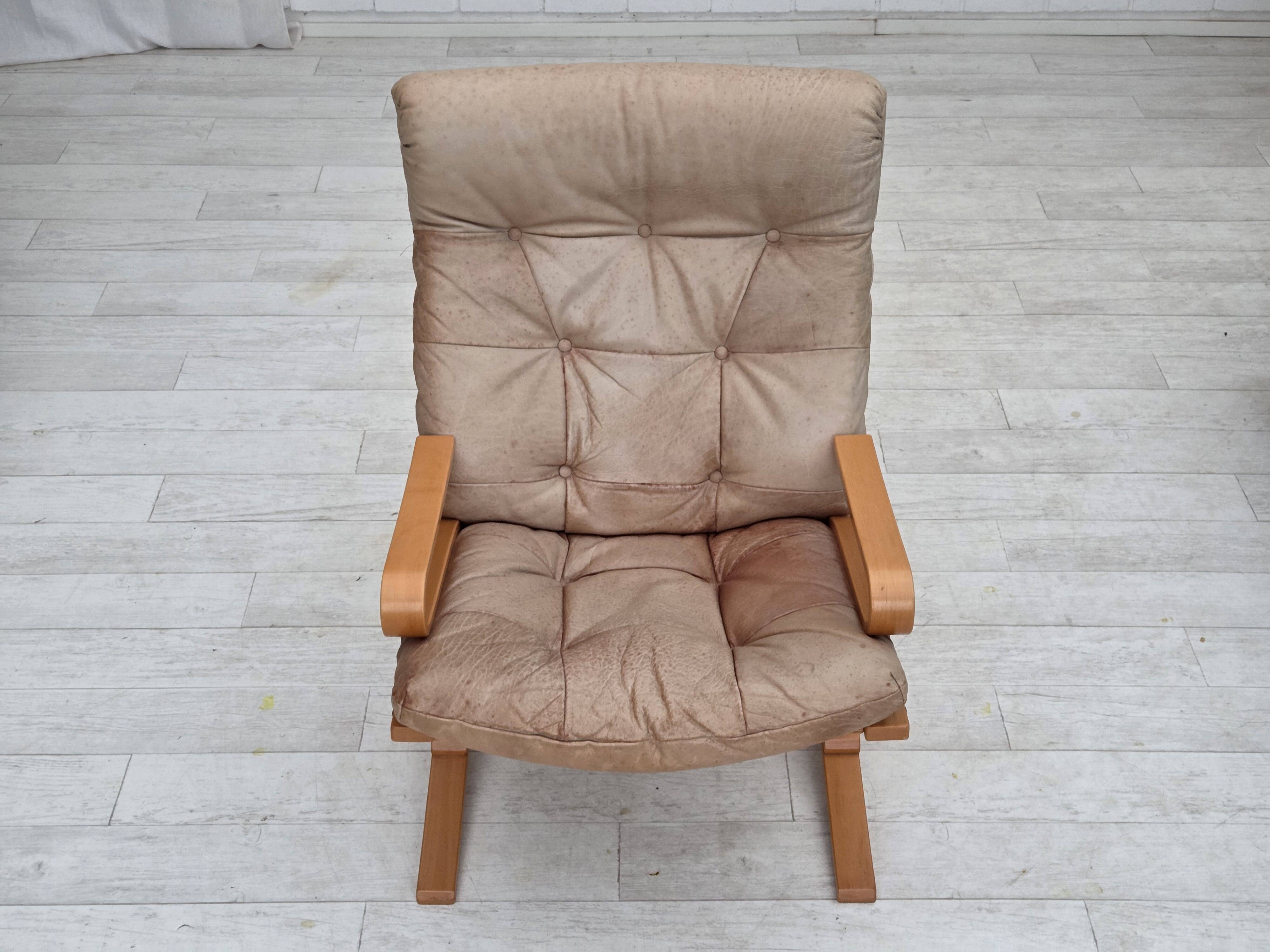 1970s, Norwegian armchair, model "Kengu", beige furniture leather.
