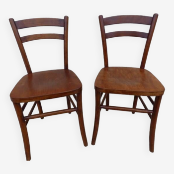 2 Chaises bistrots de marque Lutherma dans leur patine