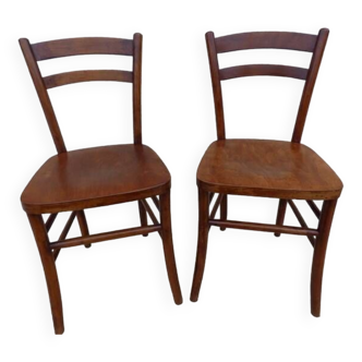 2 Chaises bistrots de marque Lutherma dans leur patine