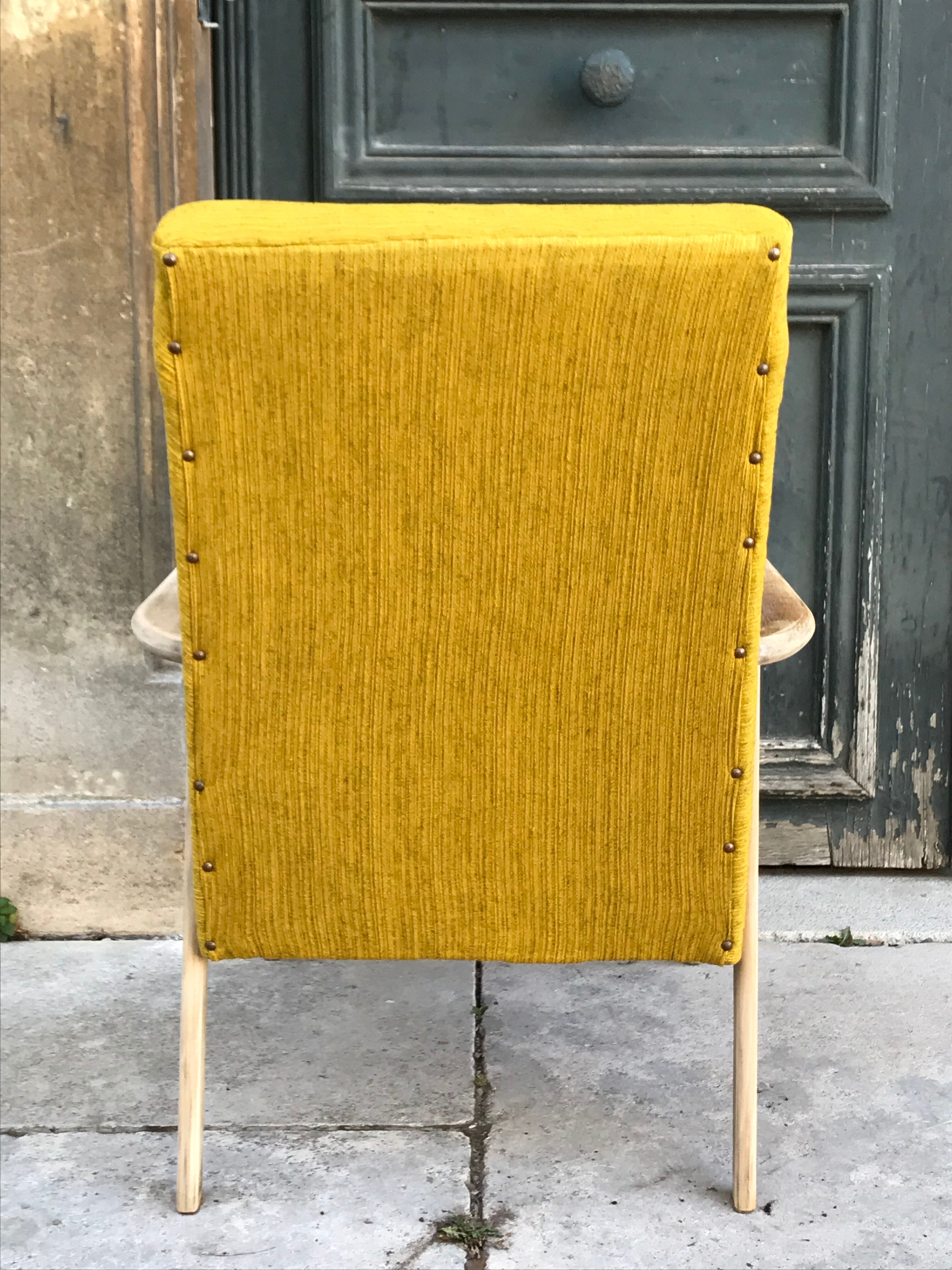 Fauteuil scandinave pieds compas