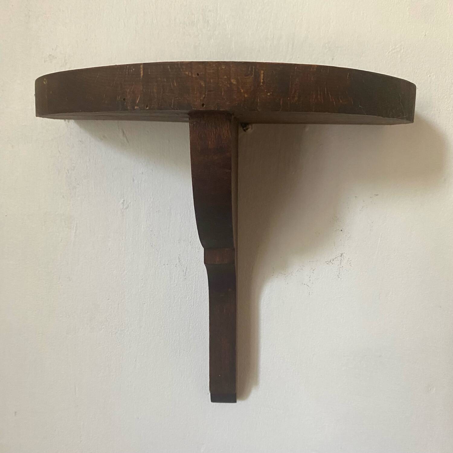 Half-moon wall shelves