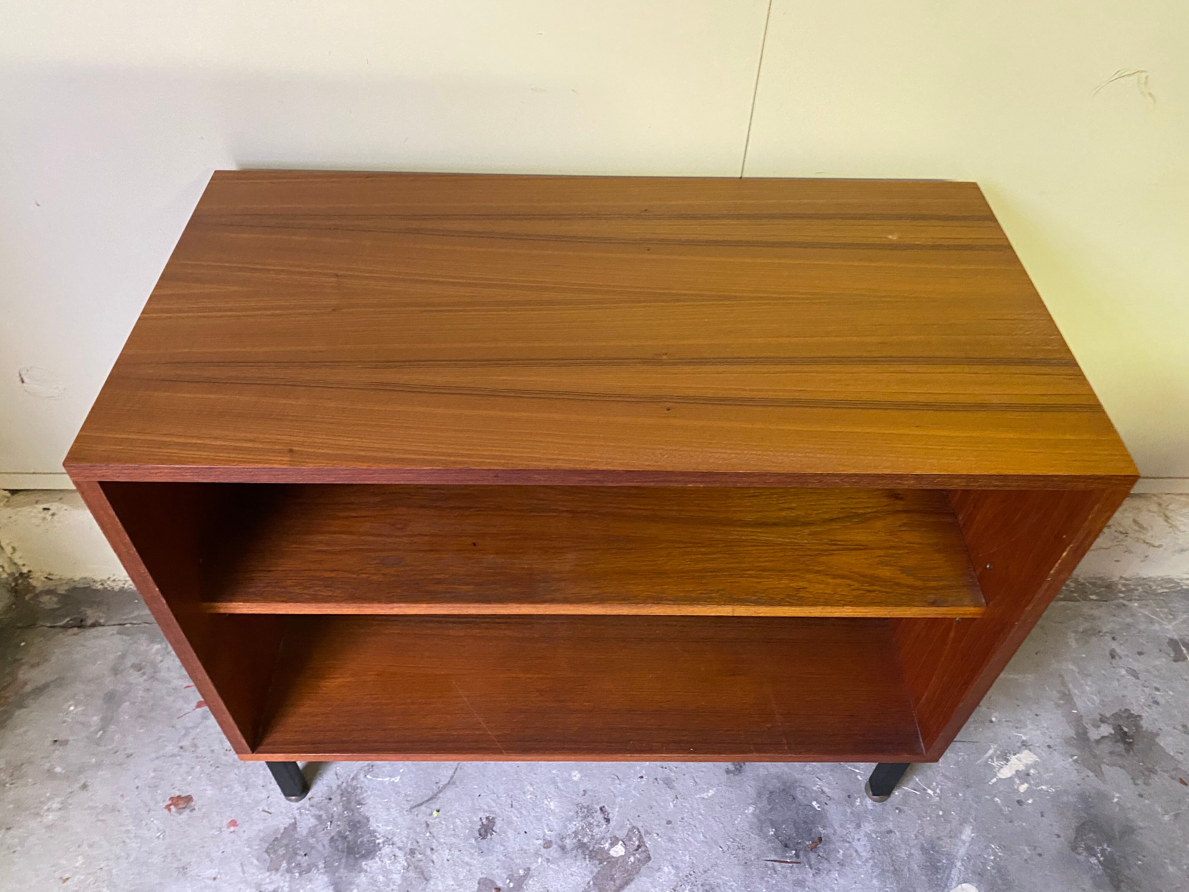 Sober vintage box furniture on adjustable metal feet