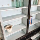 Display cabinet in patinated wood