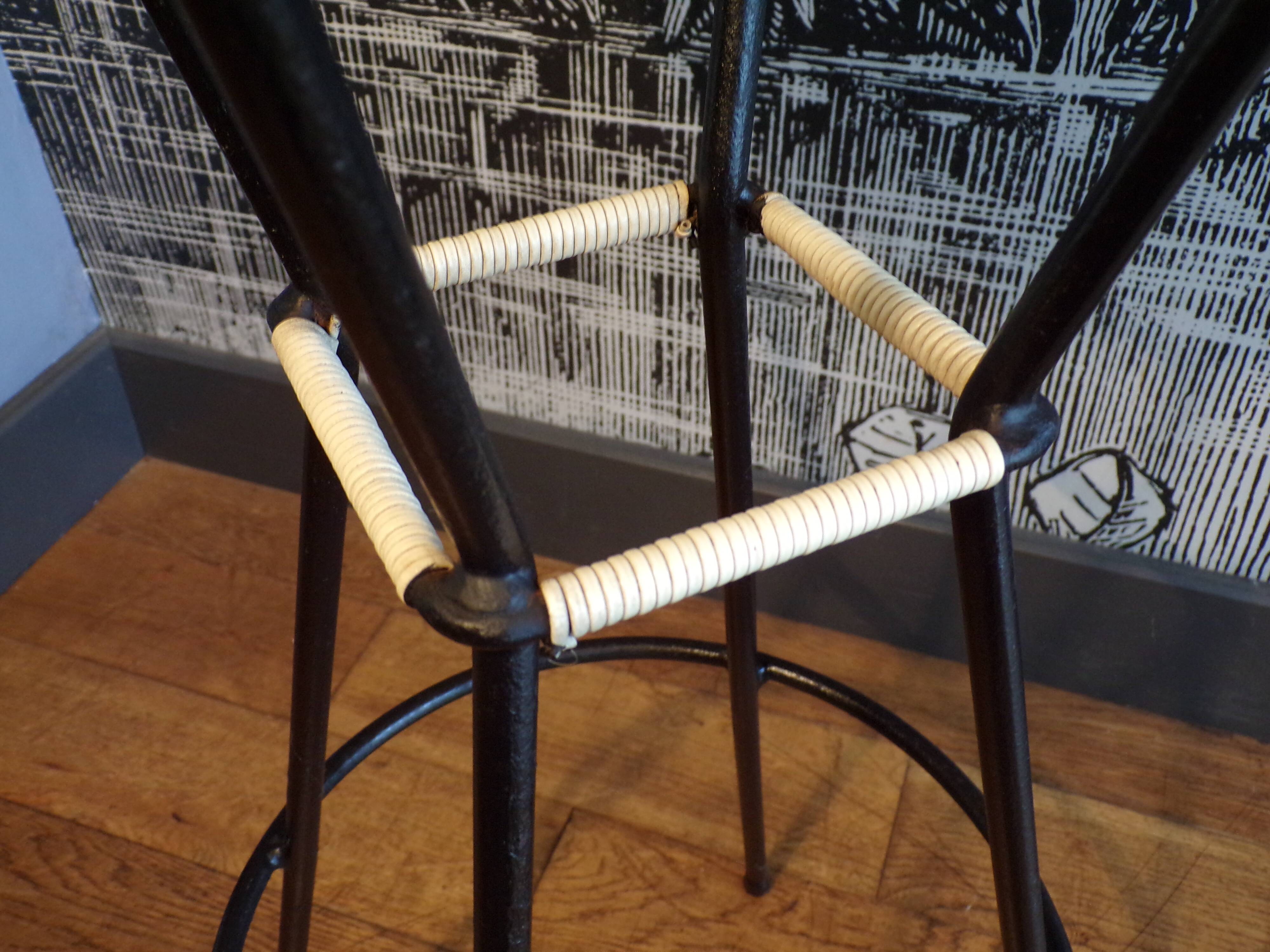 Pair of 1950s iron and rattan bar stools