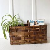 Old basket in woven chestnut wood