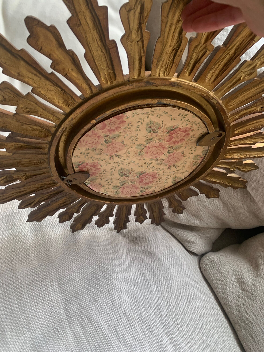 Sun mirror in old wood