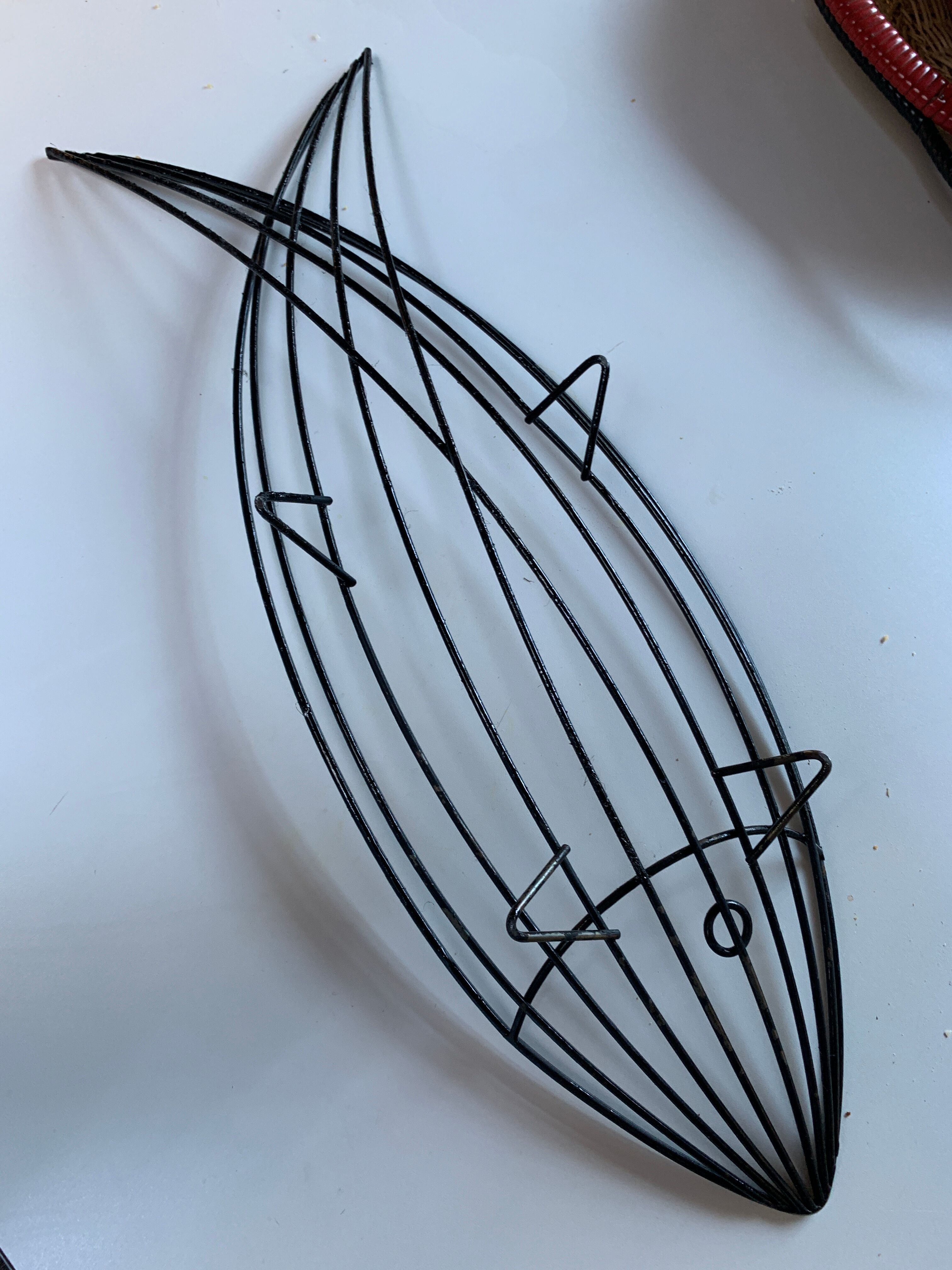 Basket in black lacquered metal "fish"