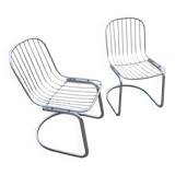 Two Gastone Rinaldi style chrome metal chairs.