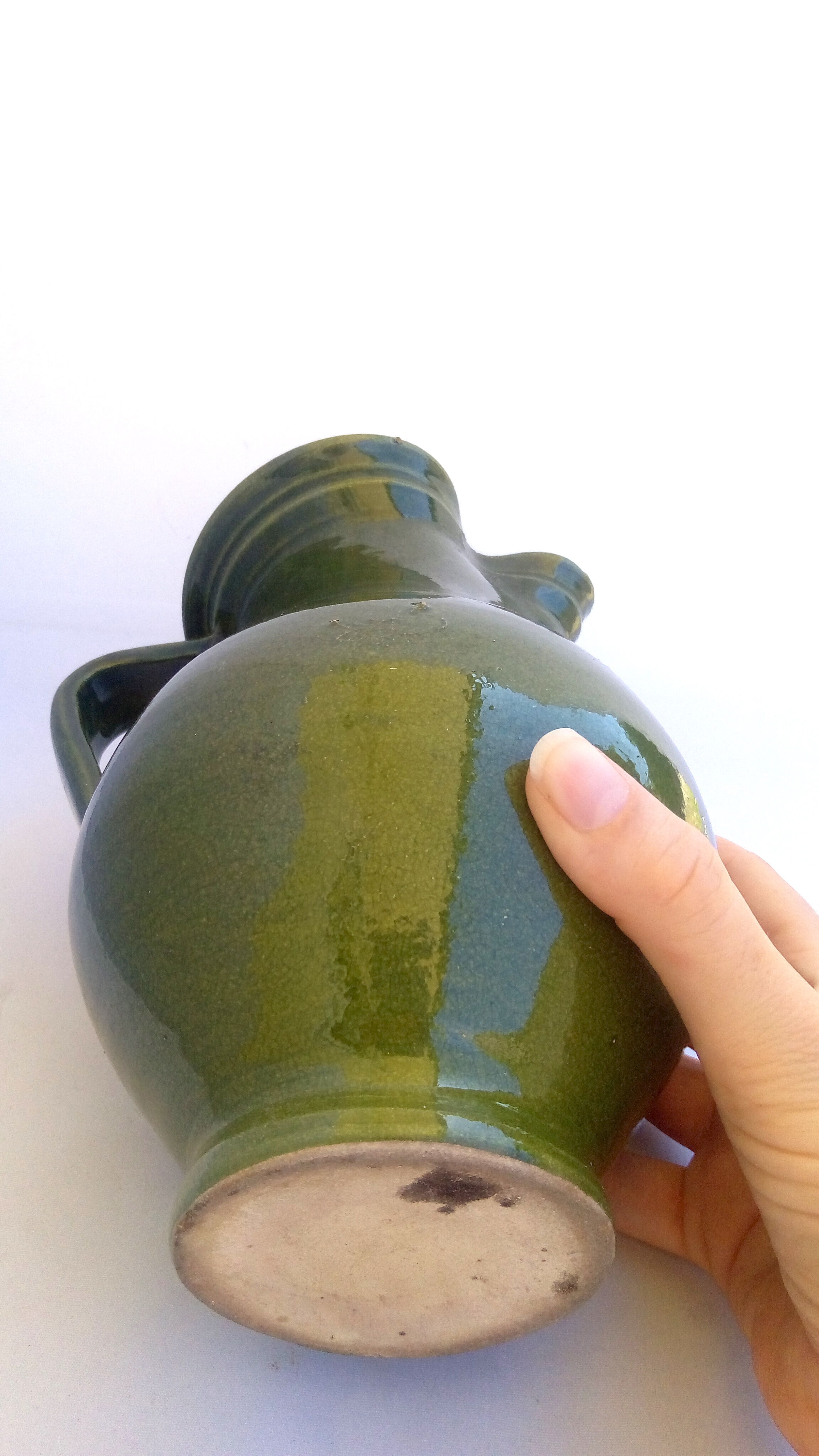 Green ceramic pitcher