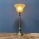 Ornate brass table lamp with mint green glass shade