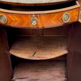 Louis XVI style chest of drawers with marquetry and marble top.