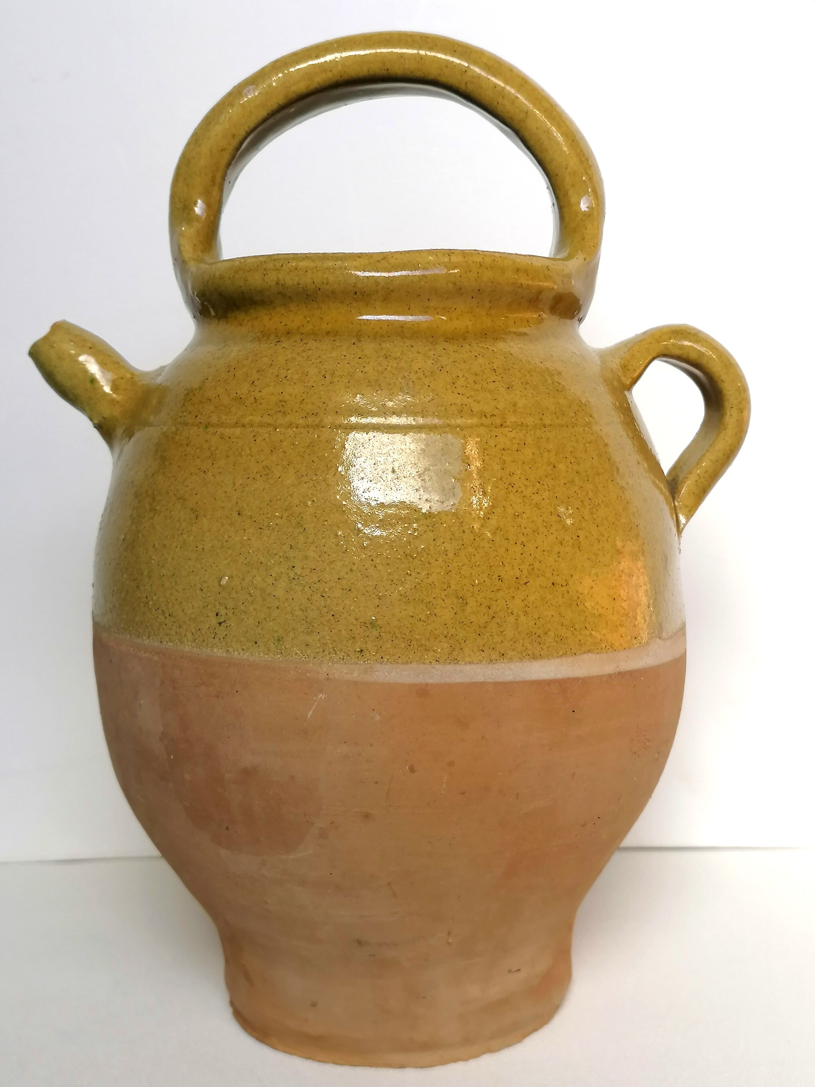 Yellow enamelled gargulette jug