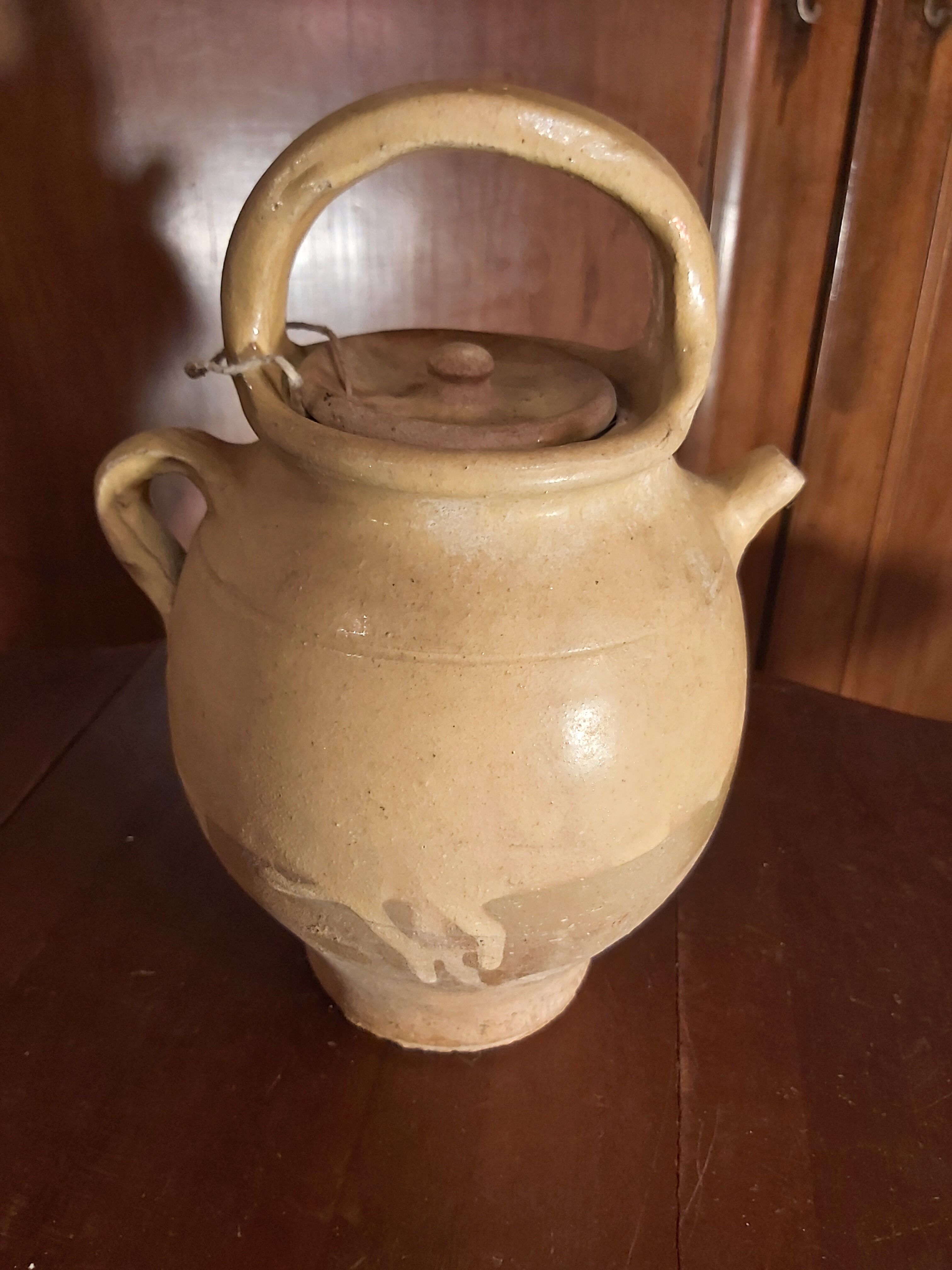 Old glazed terracotta gargoulette