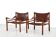 Deux fauteuils Arne Norell Sirocco en palissandre et cuir.