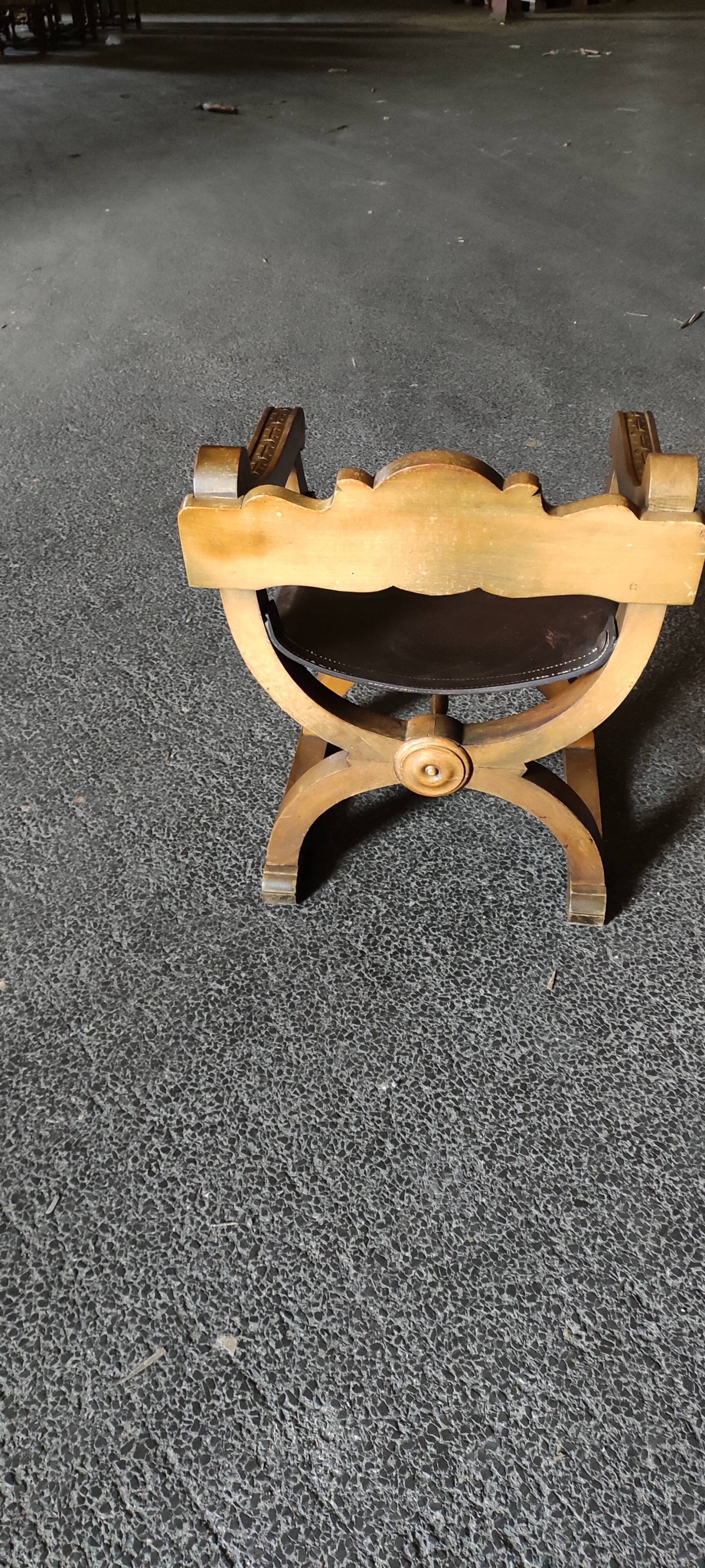 Armchair called Dagobert in wood and leather