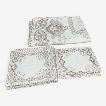 Set of vintage lace tablecloths and napkins.