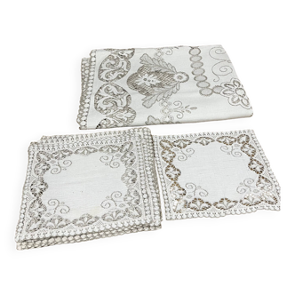 Set of vintage lace tablecloths and napkins.