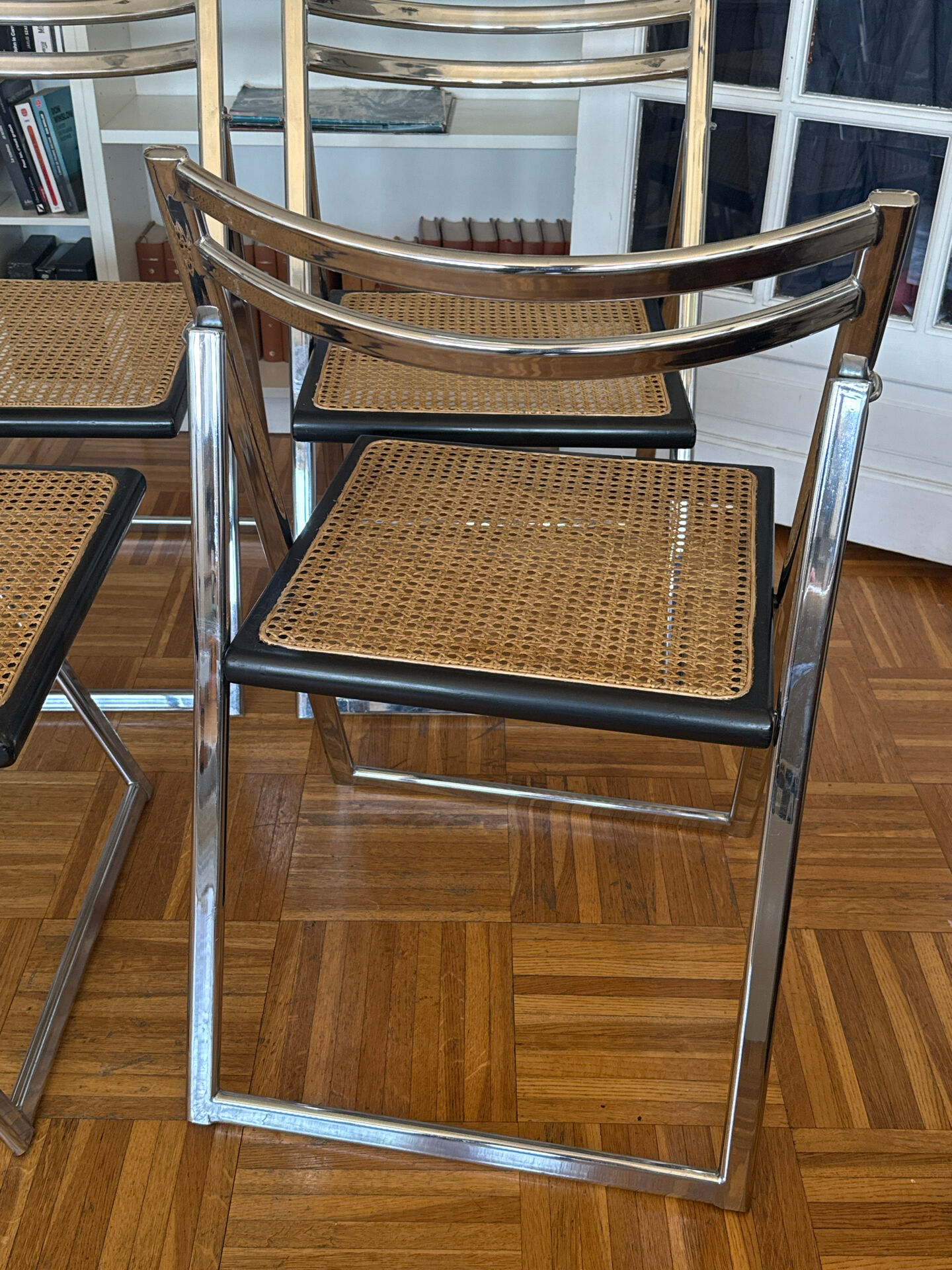 Set of 4 Italian folding chairs with caning.