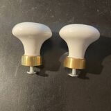 a pair of small antique porcelain and brass knob handles