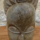 African woman sculpture in stone