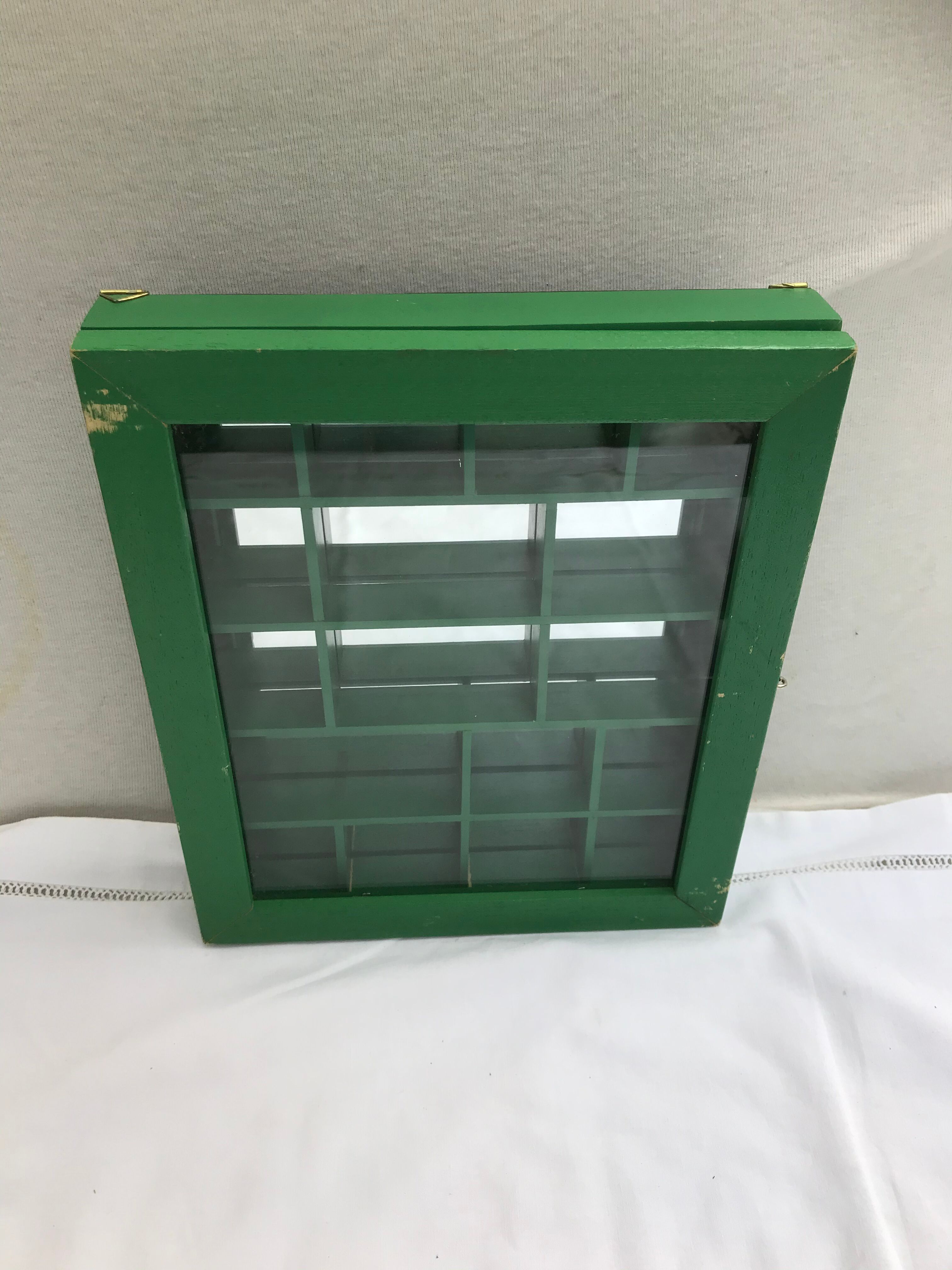 Old green wood showcase