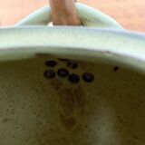 Mid-century ceramic teapot with bamboo handle, 1960s.