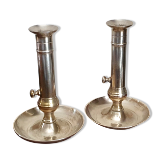 Duo of old brass candlesticks