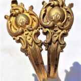 Old curtain kiss in gilded bronze