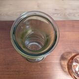 Old green milk bottle