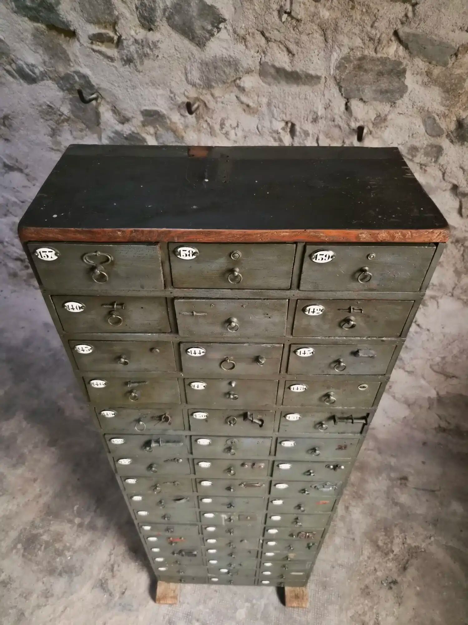 Antique hardware cabinet with 48 drawers, circa 1900.