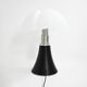 Black "Pipistrello" table lamp by Gae Aulenti for Martinelli.