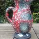 Glazed ceramic pitcher in Fat Lava style
