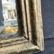 Miniature mirror from the 18th century in gilded wood, mercury glass.