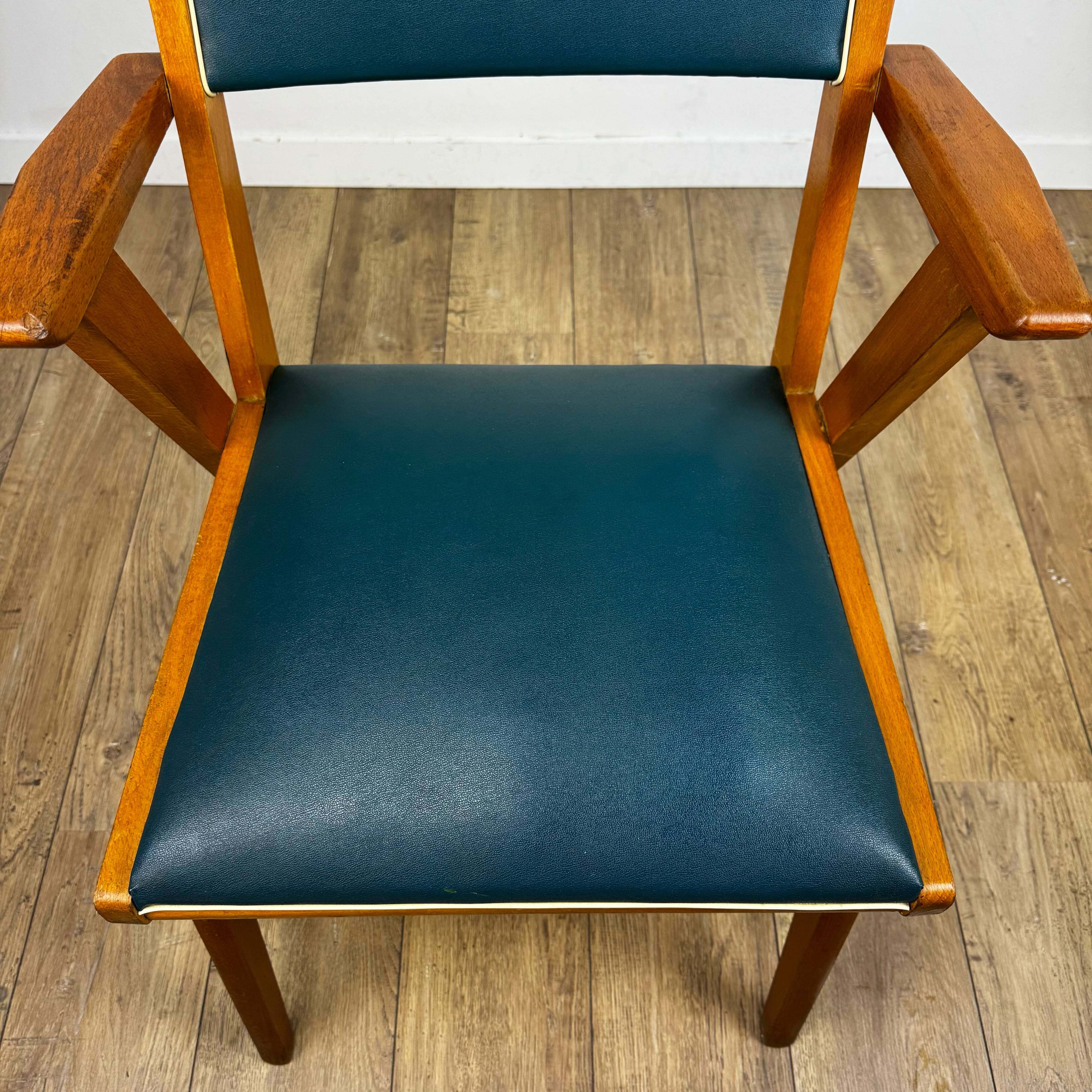 Pair of Scandinavian bridge armchairs in wood and vinyl from the 1950s.