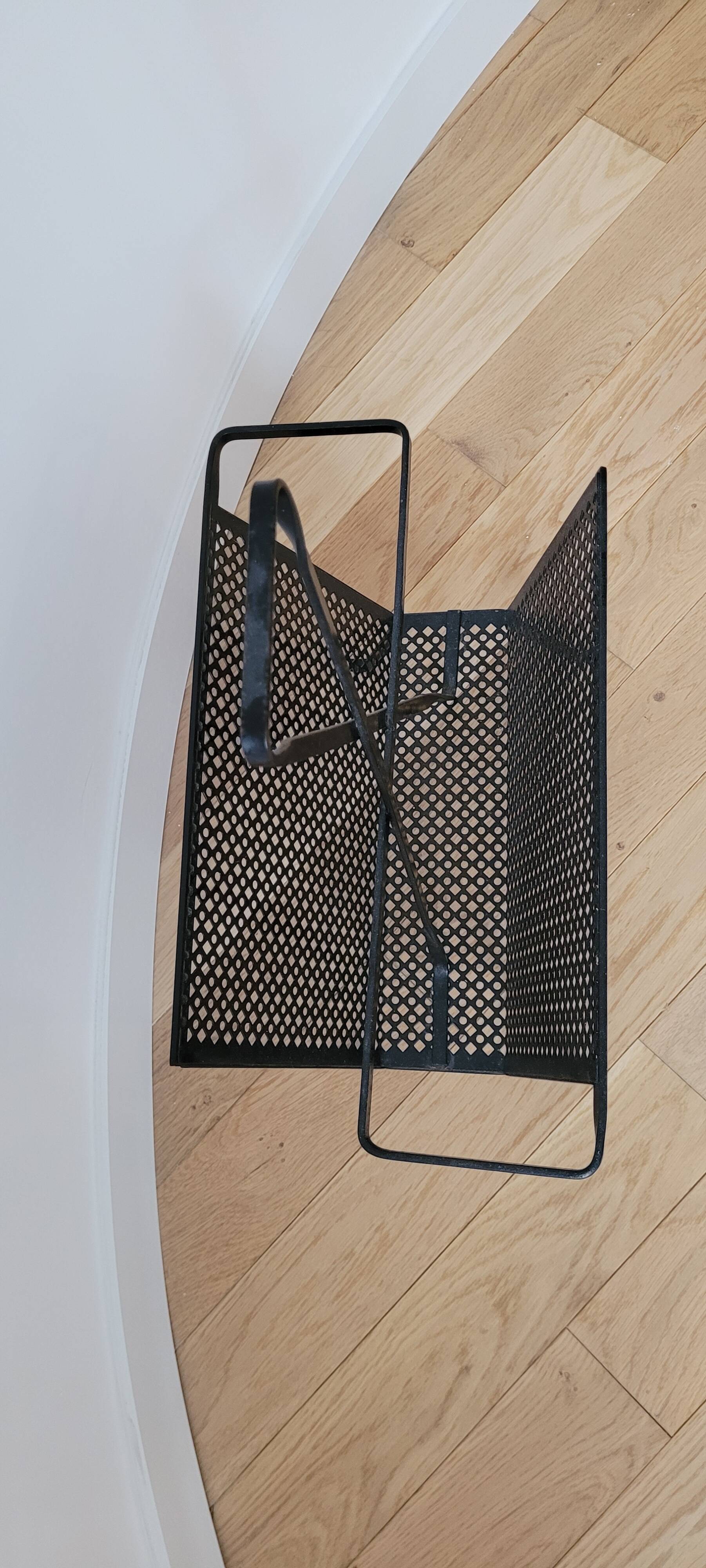 Magazine rack by Mathieu Mategot