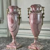 Pair of urns in pink marble and gilt bronze