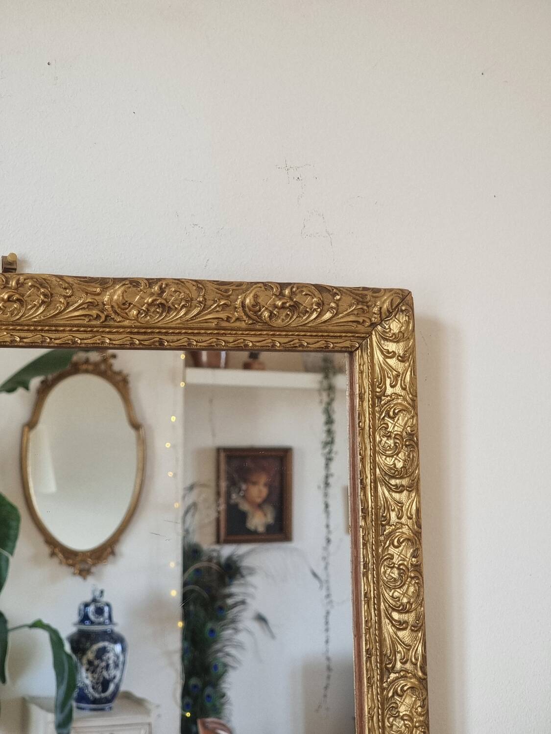 Mirror in wood and gilded stucco