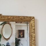 Mirror in wood and gilded stucco