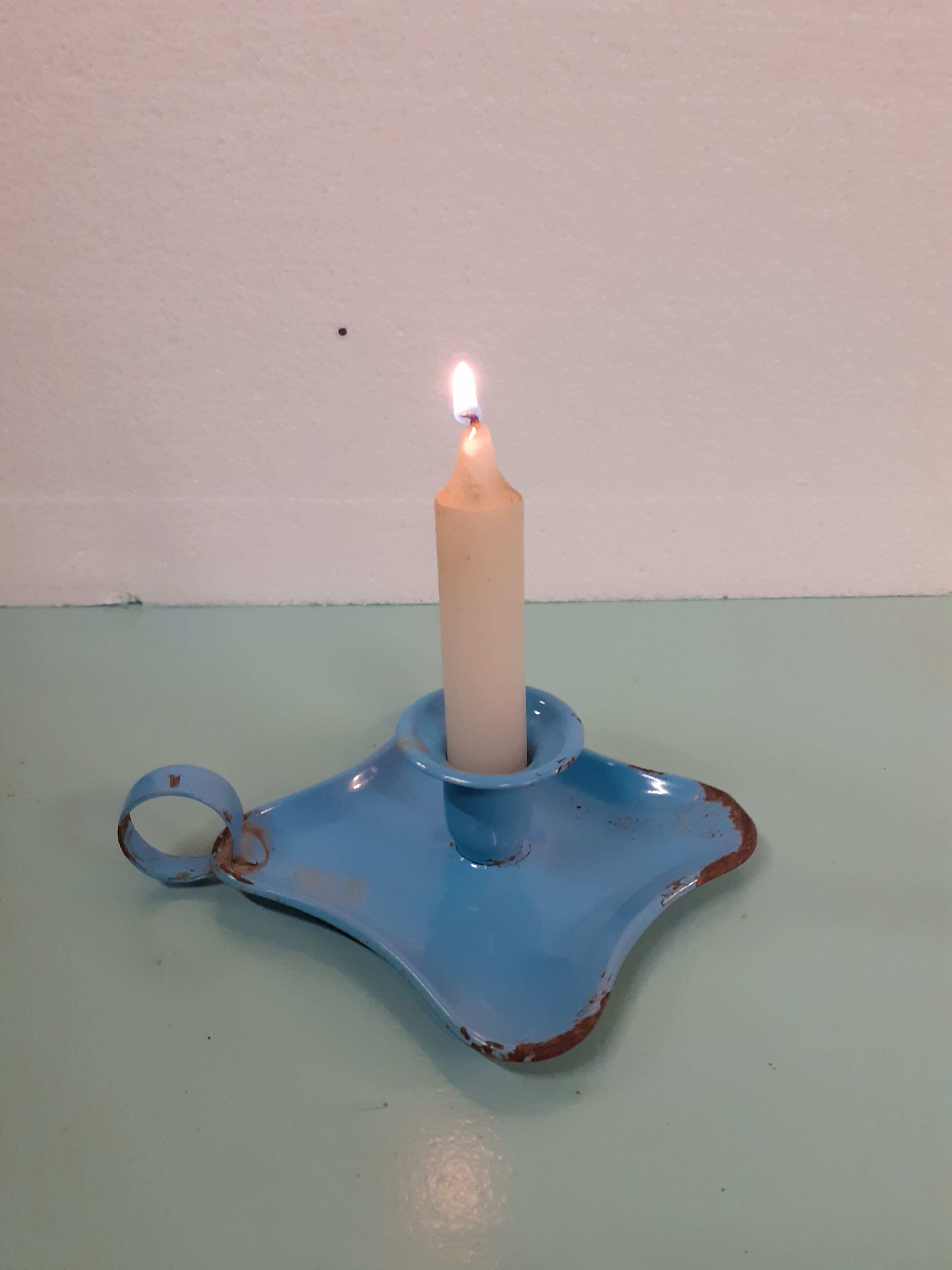 Enamelled sheet metal candlestick