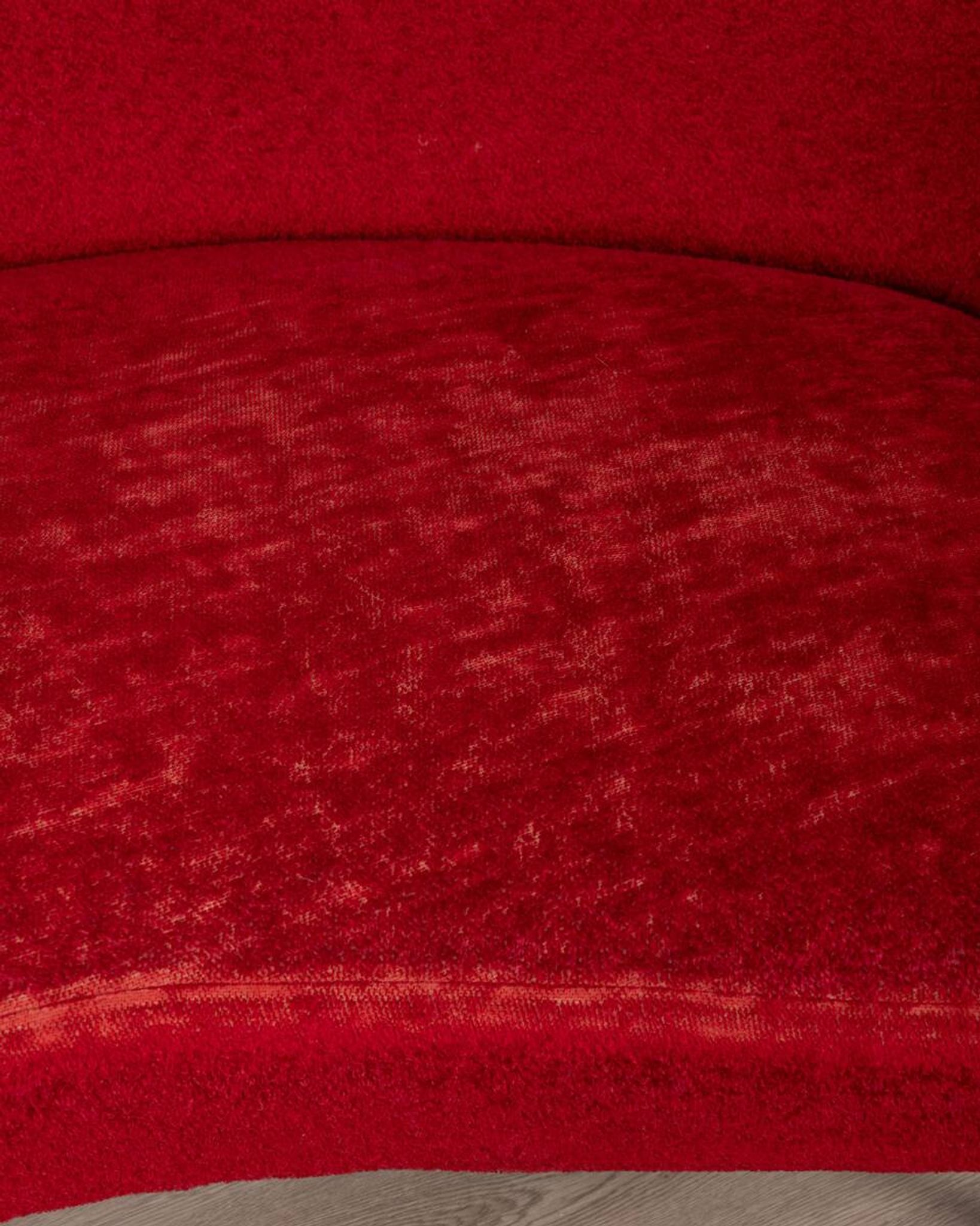 Large 1950s vintage curved sofa in red velvet italian design