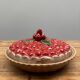 A trompe l’oeil strawberry pie dish