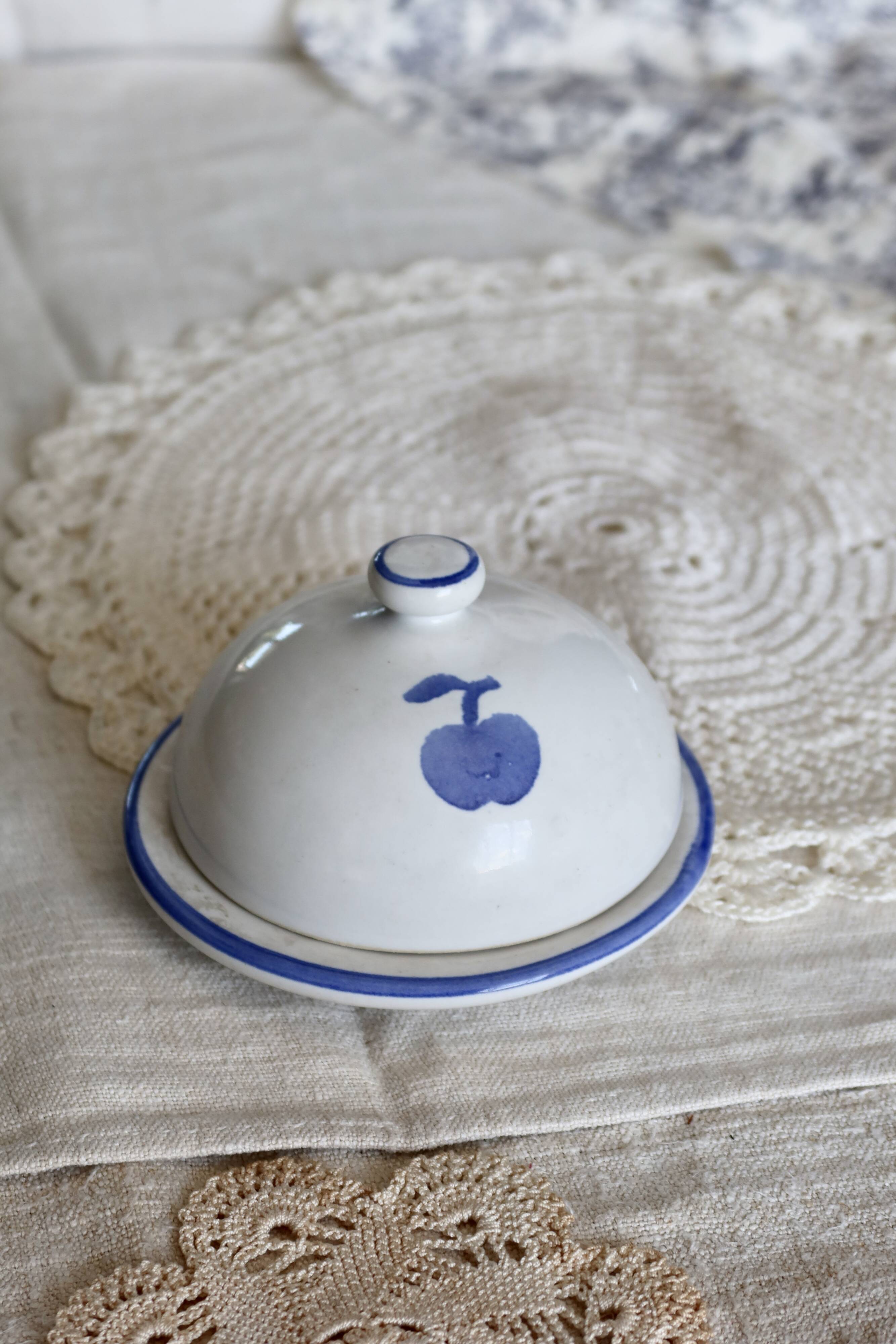Small vintage white earthenware butter bell – Blue apple motif